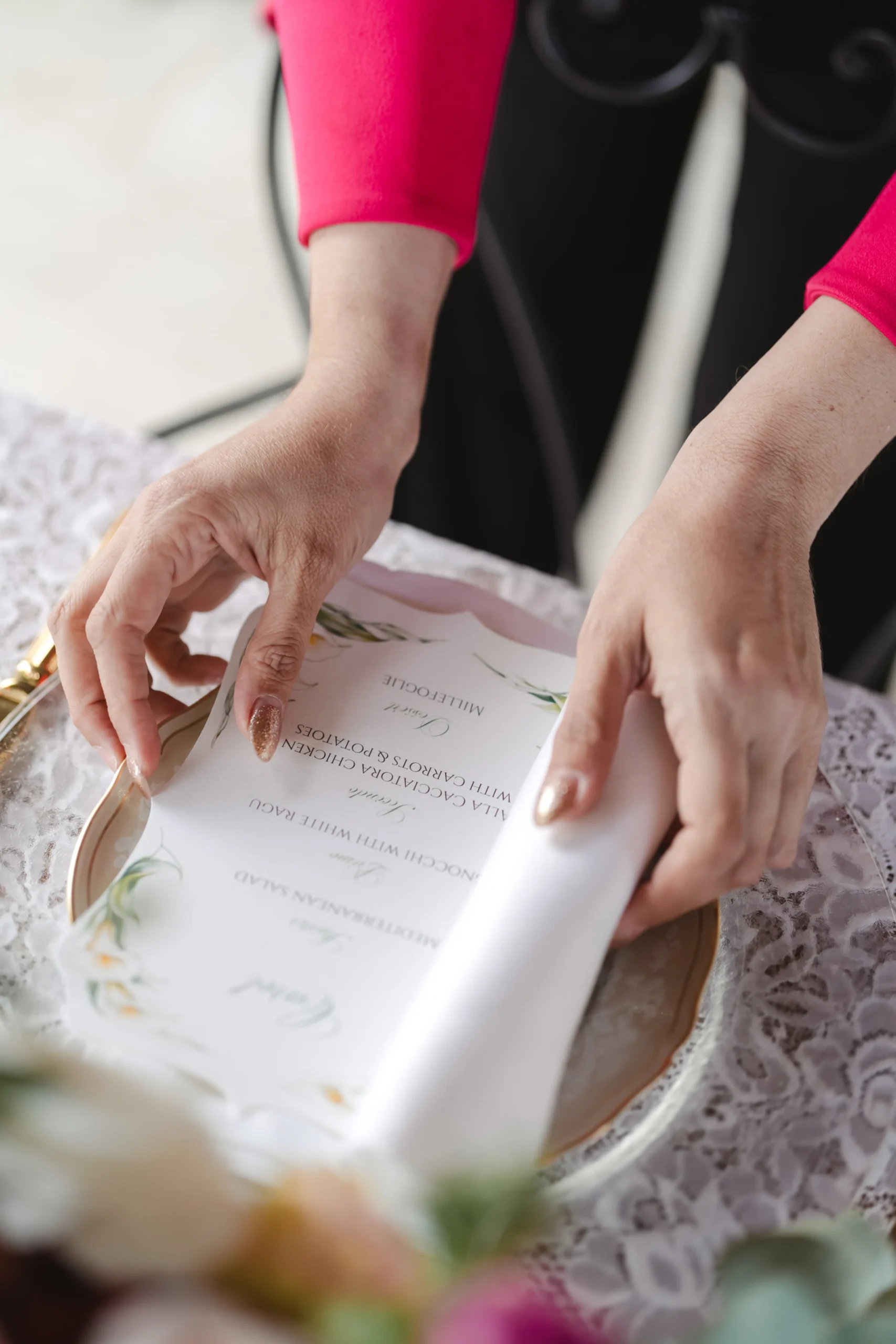 Bespoke Italian wedding menu detail, showcasing vendor coordination and personalized planning.