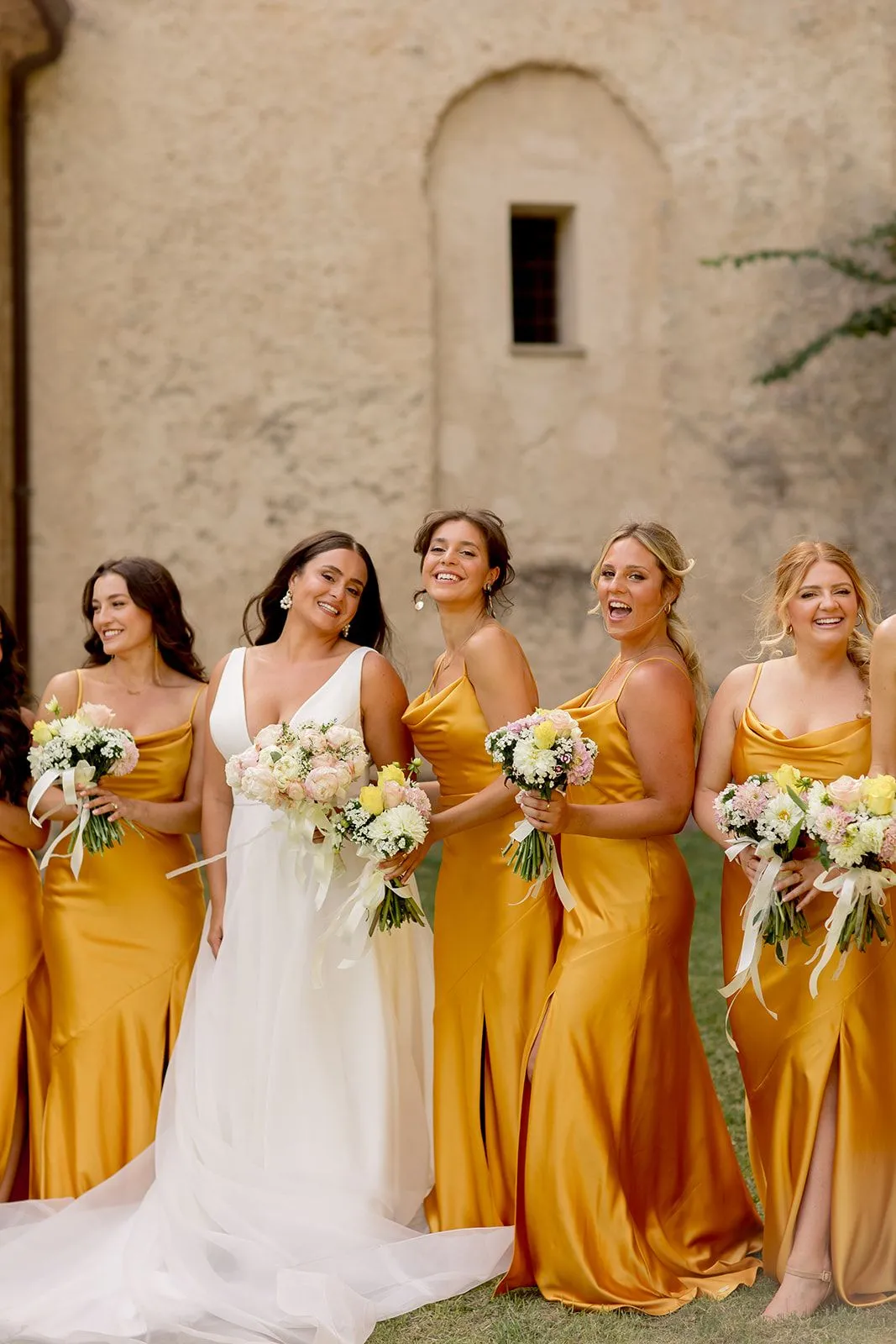 Wedding planner reviewing seating chart and floral details at Italian villa