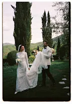 Bride and groom portrait among olive trees after the ceremony